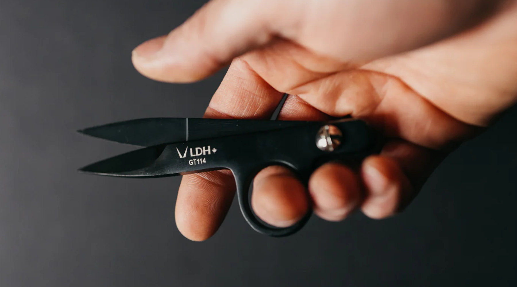 Yarn crafting tools laid out for knitting and crochet projects